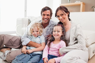 Family relaxing on a sofa