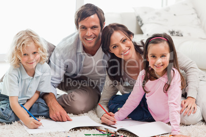 Charming family drawing together