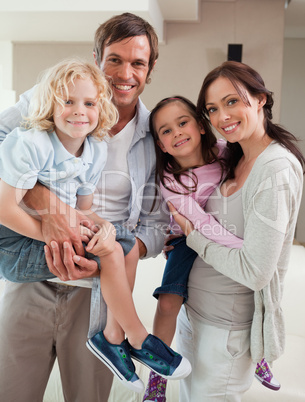 Portrait of a family posing together