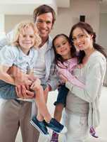 Portrait of a family posing together