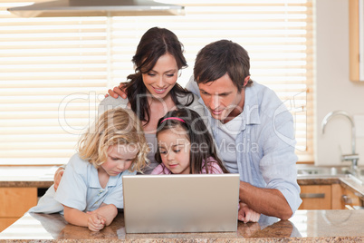 Family using a notebook together