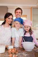Portrait of a family baking together