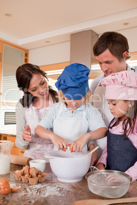 Portrait of a family baking