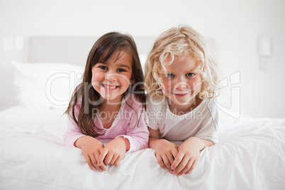 Children lying on their bellies