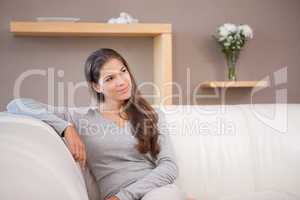 Woman sitting on the sofa