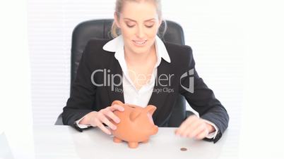 Businesswoman With Piggy Bank