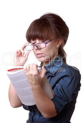 Portrait of young alluring brunette woman, holding book