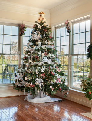 Decorated christmas tree in home
