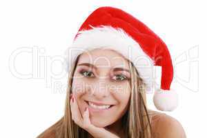 Portrait of beautiful woman wearing santa claus hat on white bac