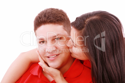 Young woman kissing her boyfriend