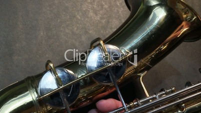 Blues saxophone player extreme closeup