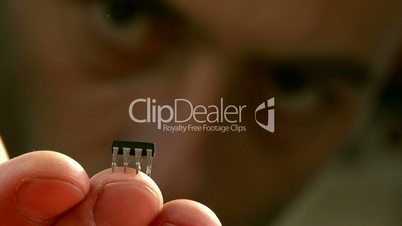 Scientist looks at the chip