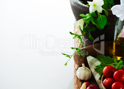 fresh vegetables and olive oil on an old weathered wood with a o