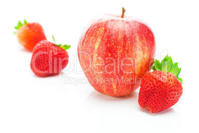big juicy red ripe strawberries and apple isolated on white