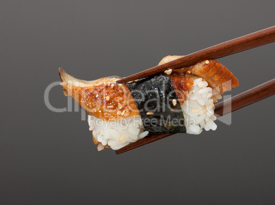 Sushi with chopsticks