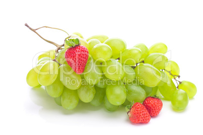 bunch of white grapes and strawberries isolated on white