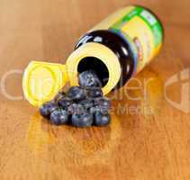 Blueberries in drug bottle