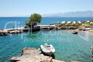 Beach and motor boats at the luxury hotel, Crete, Greece