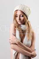 Cute blond nude woman close breast white scarf