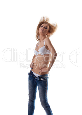 Young girl in white lingerie undress jeans