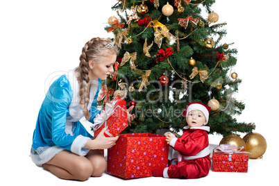 Beauty christmas girl play with baby santa claus