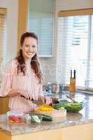 Woman slicing vegetables