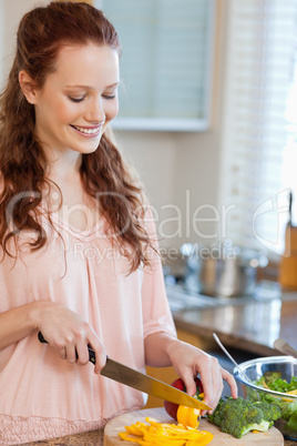 Woman cutting vegetables