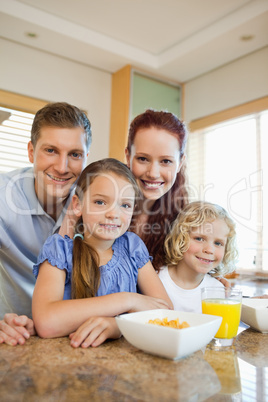 Family having breakfast in the kitchen