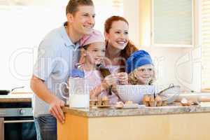 Family in the kitchen with baking ingredients