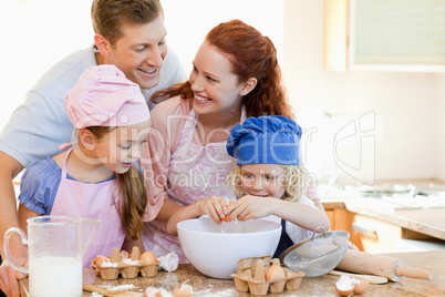 Happy family enjoys baking together