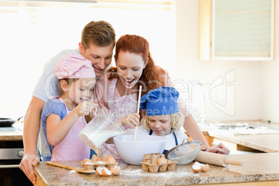 Family having a great time baking together