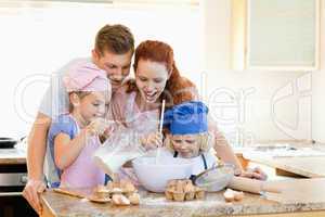 Family having a great time baking together