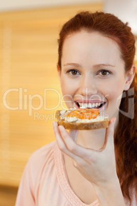 Woman having a slice of bread