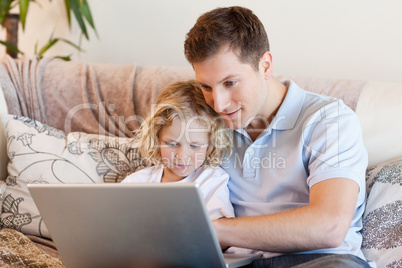 Father and son surfing the internet