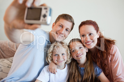 Father taking a family picture