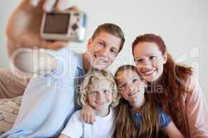 Father taking a family picture