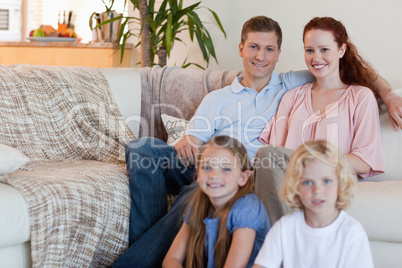 Family sitting in the living room