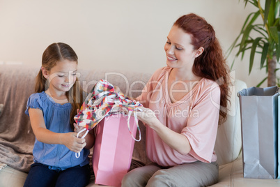 Mother and daughter looking at shopping