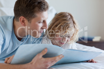 Father and son reading