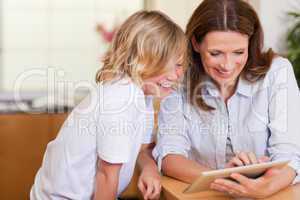 Mother and son using tablet