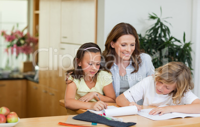 Mother having a look at children's homework