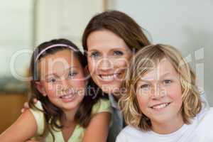 Smiling mother with children