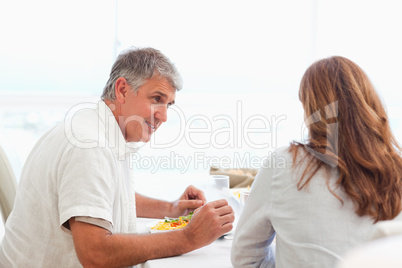 Couple talking during dinner