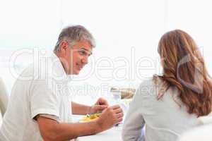 Couple talking during dinner