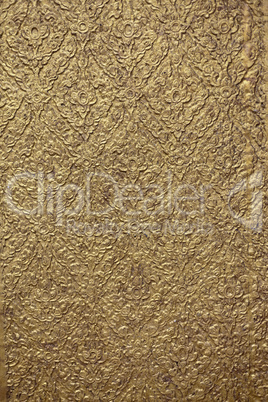 brown background with golden patterns