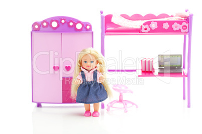 doll,doll wardrobe , bed, chair and laptop isolated on white