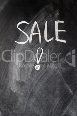 Sale written on blackboard