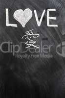 Love written on blackboard