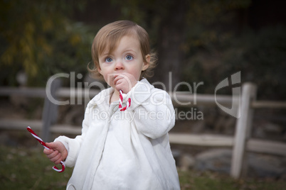 Adorable Baby Girl Playing in Park