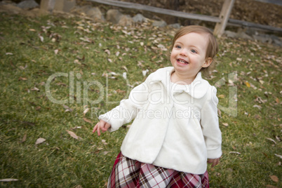 Adorable Baby Girl Playing in Park